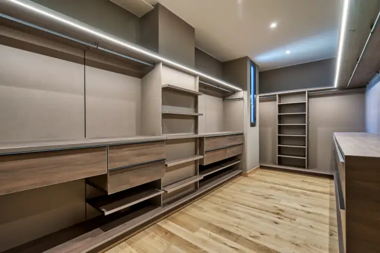 Illuminated modern walk-in closet for motion sensor closet light guide